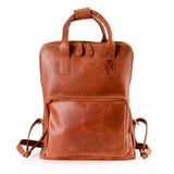 The Bolton Leather Backpack – Tan Brown by Vintage Leather Sydney features top handles, dual zippers, a spacious front zippered pocket, and adjustable shoulder straps—perfect for style and functionality.
