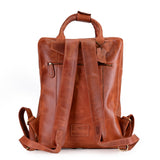 The Bolton Leather Backpack – Tan Brown by Vintage Leather Sydney features adjustable shoulder straps, a top handle, a back zipper pocket, and a luggage tag. Premium brown leather construction offers both style and durability.