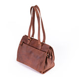 The Leather Handbag Fennel by Vintage Leather Sydney features double shoulder straps and a front zipper pocket, offering style and functionality with ample space for essentials, all presented on a white background.