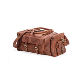 The Leather Duffle Bag - Colorado by Vintage Leather Sydney features brown handmade leather, multiple pockets, gold buckles, sturdy handles, and an adjustable shoulder strap—ideal as a stylish travel bag.
