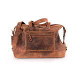 The Vintage Leather Sydney "Leather Duffle Bag Tokyo" is a brown leather duffel with a front zip pocket, two handles, and an adjustable shoulder strap, shown on a plain white background.