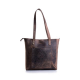 The Leather Tote ARIA by Vintage Leather features two shoulder straps, a zip closure, and a spacious front pocket, shown against a white background.