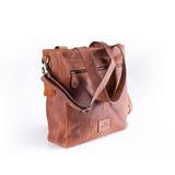 The Leather Work Tote Bag Parsley by Vintage Leather Sydney is a brown leather tote with double handles, a front zippered pocket, textured surface, and visible stitching, shown against a white background.
