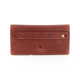 A brown leather checkbook wallet with a front strap closure and a brass snap button, featuring an embossed logo and text on the front, set against a plain white background.