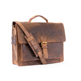 Brown leather briefcase with a strap on a white background