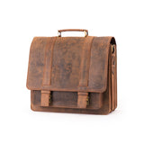 The Scout Leather Briefcase by Vintage Leather Sydney features brown leather, a top handle, front flap with two buckled straps, and a vintage worn texture, displayed against a plain white background.