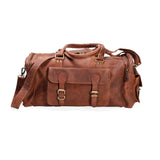 The Leather Duffle Bag - Colorado by Vintage Leather Sydney is a spacious brown handmade bag with multiple pockets, buckles, handles, and a shoulder strap—ideal for travel and shown against a white background.