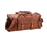 The Leather Duffle Bag - Colorado by Vintage Leather Sydney features brass buckles, front pockets, shoulder strap, and sturdy handles—perfect for travel—displayed against a white background.