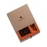 The Leather Gift Box With Credit Card Wallet & Keyring by Vintage Leather Sydney features a dark brown wallet and a metal keyring in an orange insert, all presented in a partially open, branded brown leather box.