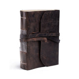 The Indigo Journal Leather by Vintage Leather is a closed, dark brown Buffalo leather journal with white spine stitching and a leather strap, set against a white background—ideal for personalisation.