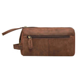 leather toiletry bag with brass fittings and handle to carry the bag.
