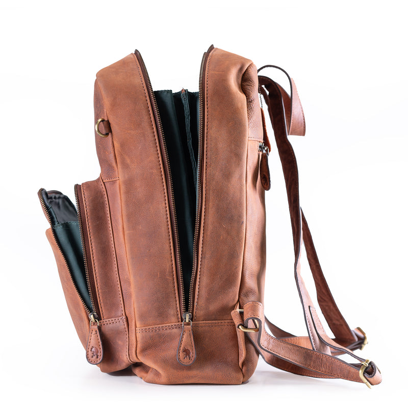 The Leather Work Backpack Burley by Vintage Leather Sydney is displayed upright with unzipped main and front compartments, showcasing its black interior lining and adjustable shoulder straps—ideal for stylish, functional everyday use.