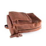 The Vintage Leather Sydney Leather Work Backpack Burley, shown on its side against a white background, reveals multiple zippered compartments and adjustable straps—showcasing this stylish accessorys practical design.