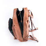 The Leather Work Backpack Burley by Vintage Leather Sydney features tan leather, multiple zippered compartments, a dark interior, adjustable straps, and gold-tone hardware—all showcased on a white background for a stylish look.