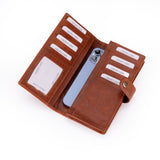 A brown leather bi-fold wallet shown open on a white background, containing card slots, an ID window, and a phone pocket holding a blue smartphone.