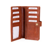 An open brown leather wallet with multiple card slots, an ID window, and a snap-button strap, shown on a plain white background.
