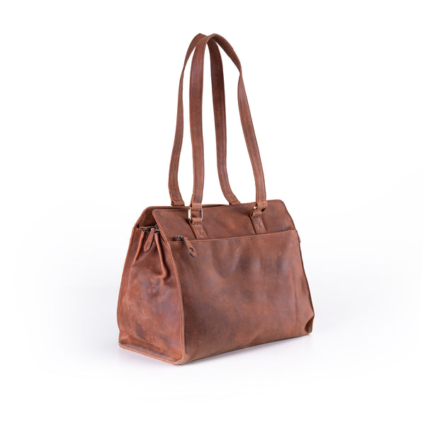 The Leather Handbag Fennel by Vintage Leather Sydney is a brown leather shoulder bag with long double straps, a front zipper pocket, and a structured rectangular shape—perfect for carrying daily essentials. Shown on a white background.