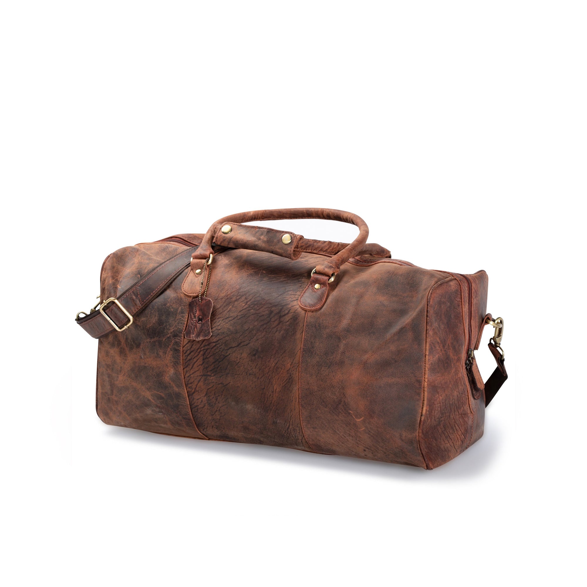 The Vintage Leather Panama Leather Duffle Bag features brown leather, visible stitching, brass hardware, a shoulder strap, and two handles—ideal as a stylish overnight bag and shown on a white background.