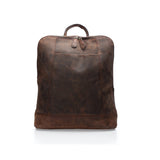 The Leather Laptop Backpack Baku by Vintage Leather Sydney stands upright against a white background, featuring brown worn leather, a top handle, and double zipper—perfect for carrying your essentials in vintage style.