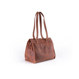 The Leather Handbag Fennel by Vintage Leather Sydney is a brown leather tote bag with double shoulder straps, a simple design, and a front pocket.