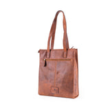 Brown leather tote bag on a white background