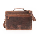 The Leather Messenger Bag Prestige by Vintage Leather Sydney features brown leather, a top handle, adjustable shoulder strap, front zippered pocket, and a small logo patch. Its slightly worn finish adds vintage charm to this stylish accessory.