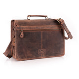 The Leather Messenger Bag Prestige by Vintage Leather Sydney features vintage-style brown leather, a top handle, adjustable shoulder strap, front zipper pocket, and a small embossed logo—crafted with meticulous detail for timeless everyday style.