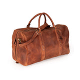 A brown distressed leather duffel bag with dual top handles, a front zippered pocket, and a detachable shoulder strap, shown on a white background.
