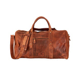 A brown distressed leather duffel bag with dual top handles, a detachable shoulder strap, and a front zippered pocket, shown against a plain white background.