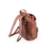 Brown leather backpack on a white background