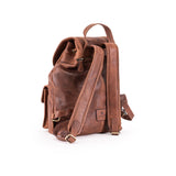 Brown leather backpack on a white background
