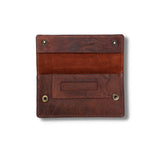The Personalised Tobacco Pouch Jason by Vintage Leather Sydney, crafted from brown full-grain leather with a suede-lined interior, multiple compartments, and brass snap buttons, is shown open against a white background—ideal for organizing rolling papers.