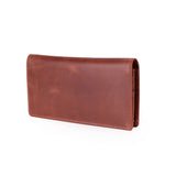 A brown leather checkbook wallet shown from a three-quarters angle on a plain white background.