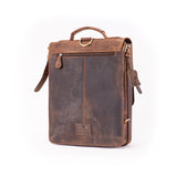 The Ryder Courier Satchel by Vintage Leather Sydney, featuring brown distressed leather, a top handle, front zipper pocket, and shoulder strap, stands upright against a white background—perfect for stylish functionality.