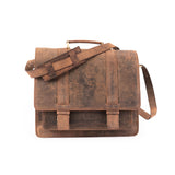 The Scout Leather Briefcase by Vintage Leather Sydney is a brown leather satchel with a top handle, adjustable shoulder strap, and flap closure with two front straps. It has a vintage, worn look and is shown against a white background.
