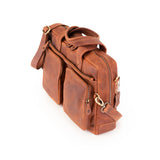 The Leather Messenger Bag Zenith by Vintage Leather Sydney features two front pockets, a detachable shoulder strap, and sturdy handles for business or travel—blending style and practicality, shown on a white background.