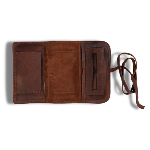The William Pouch by Vintage Leather is a soft leather tobacco pouch with two pockets and a secure strap, shown open on a white background.